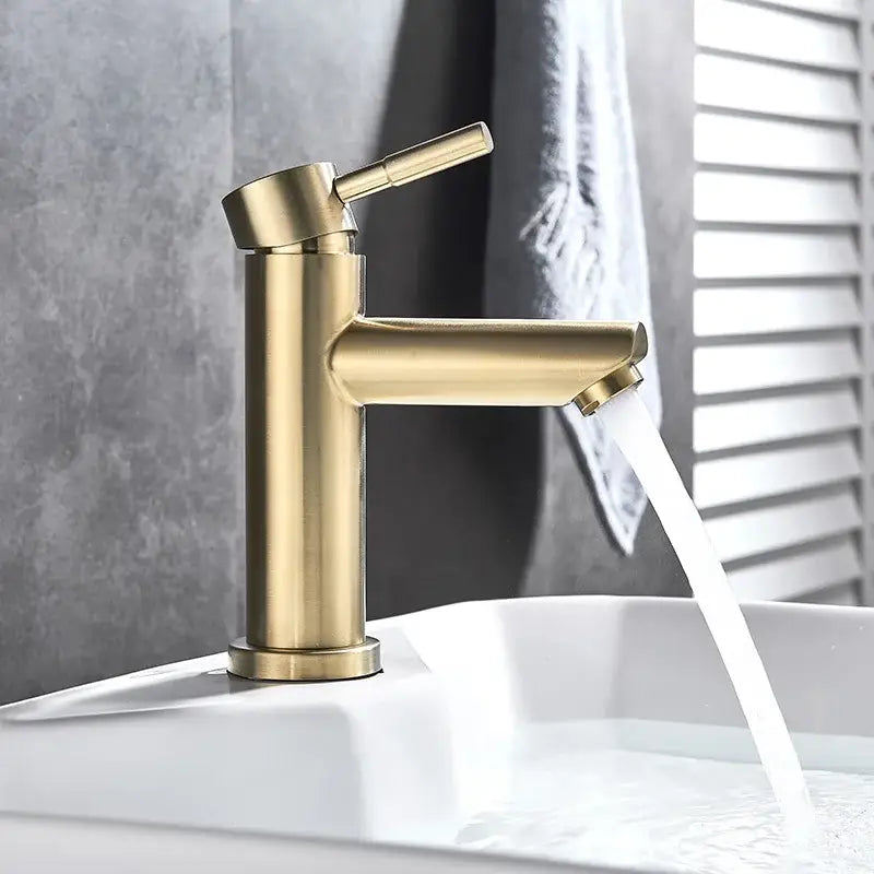 Modern brushed golden brass basin faucet with sleek minimalist design and single handle for bathroom decorbites golden brass