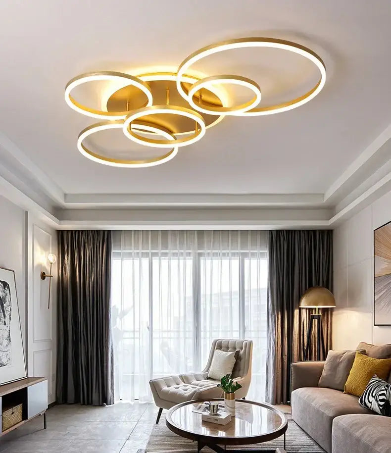 Modern brushed golden led ceiling chandelier with interconnected rings in brushed golden led for living room decorbites golden led ceiling