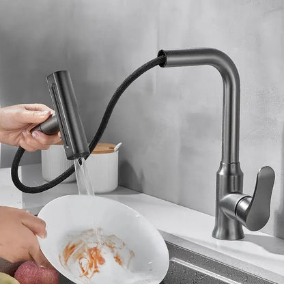 Black matte pull-down kitchen faucet with flexible hose and sleek design for modern gray waterfall kitchen use