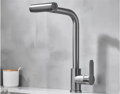 Modern brushed gray waterfall kitchen faucet with sleek curved spout and pull out spray in stainless steel design
