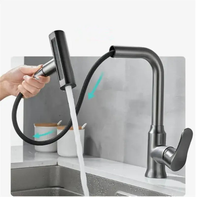 Black matte pull-down kitchen faucet with flexible hose and spray head paired with gray waterfall kitchen faucet design