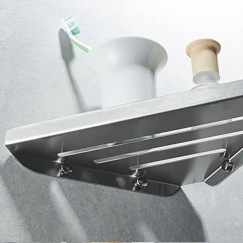 Modern brushed nickel bathroom hardware set featuring a stainless steel shelf with brushed finish and integrated hooks