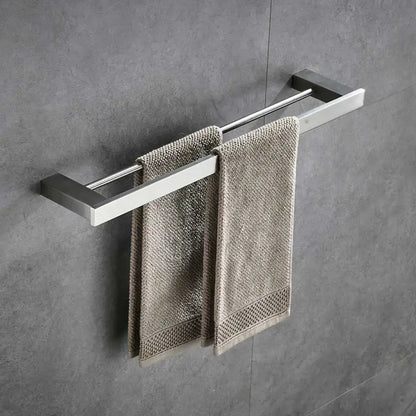 Modern brushed nickel bathroom hardware set featuring a stainless steel double towel rack with beige towels