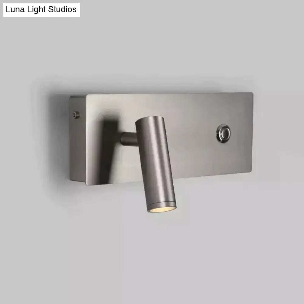 Modern brushed nickel led dimmable reading wall light with a sleek cylindrical head and minimalist rectangular base for bedroom