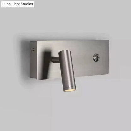 Modern brushed nickel led dimmable reading wall light with a sleek cylindrical head and minimalist rectangular base for bedroom