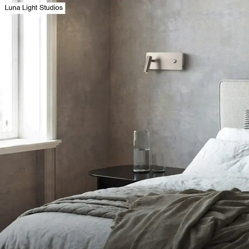 Modern brushed nickel led dimmable reading wall light with adjustable arm and sleek metallic finish for bedroom use