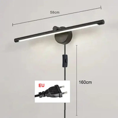 Black modern brushed nickel led wall lamp with sleek elongated design and adjustable height for bathroom use with motion sensor