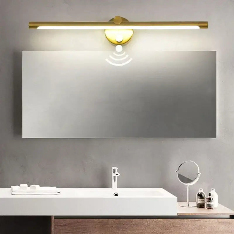 Modern gold-finished led wall lamp with sleek bar design and integrated motion sensor for bathroom lighting