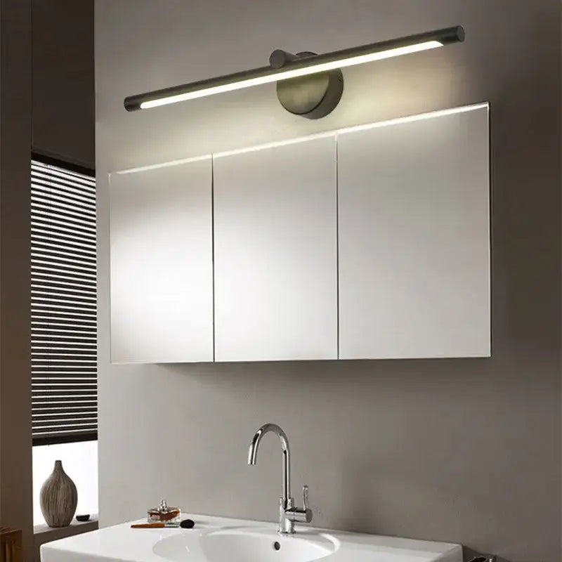 Modern brushed nickel led wall lamp with sleek elongated design and integrated motion sensor lighting for bathroom use