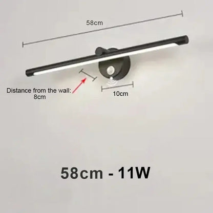 Black modern brushed nickel led wall lamp with sleek elongated design 58cm length and motion sensor for bathroom use