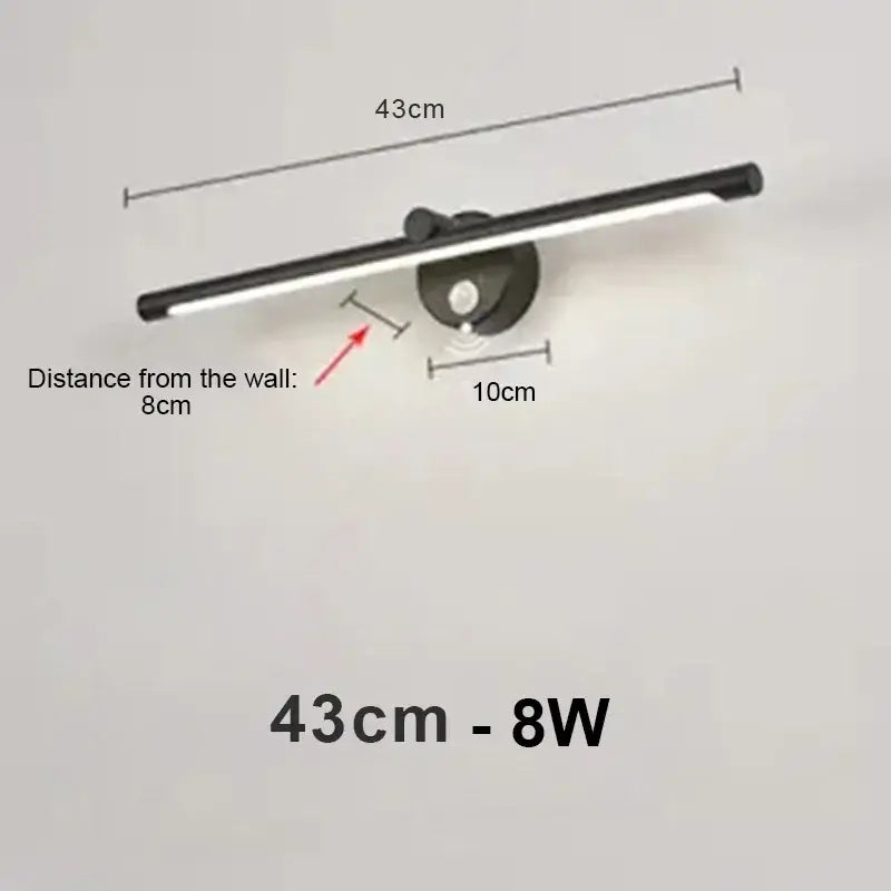 Black modern led wall lamp with sleek elongated bar design and adjustable bracket for bathroom lighting with motion sensor