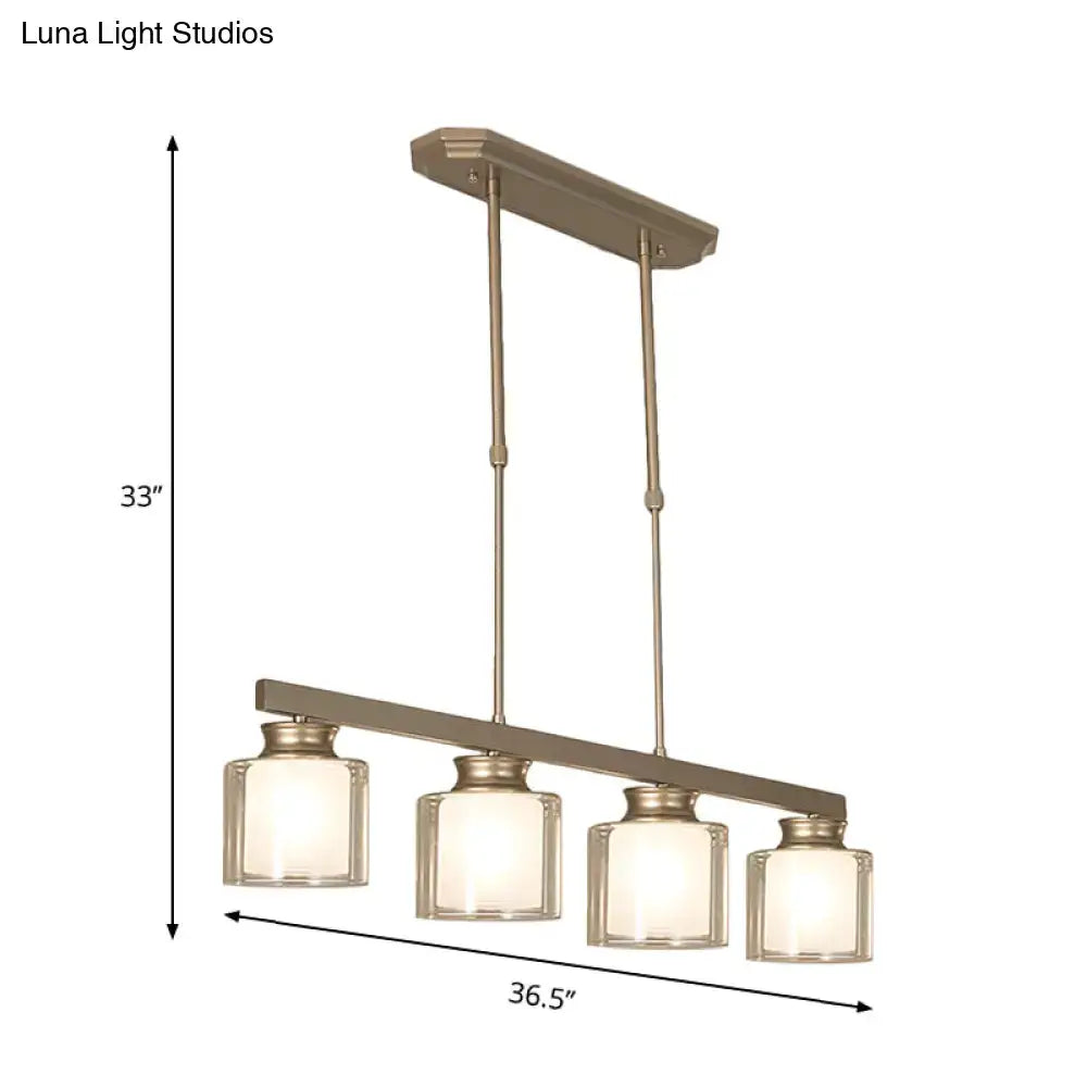 Modern brushed nickel pendant light with four square clear glass shades for dining room use