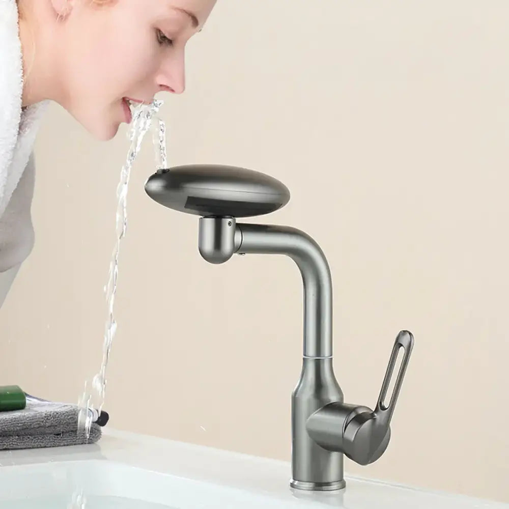 Modern brushed nickel rotation stainless steel kitchen faucet with a matte black curved design and oval spout