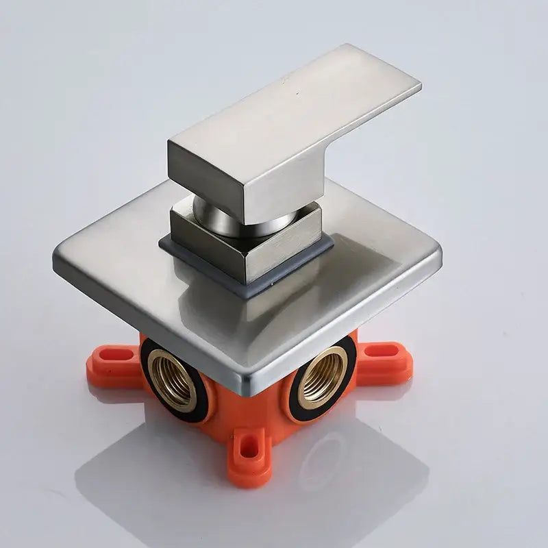 Modern brushed nickel shower mixer valve faucet with sleek brushed stainless steel square spout and orange mounting base