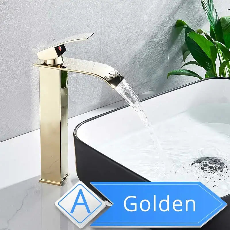Modern brushed nickel single lever basin faucet with a golden waterfall design and polished metallic finish for bathroom use