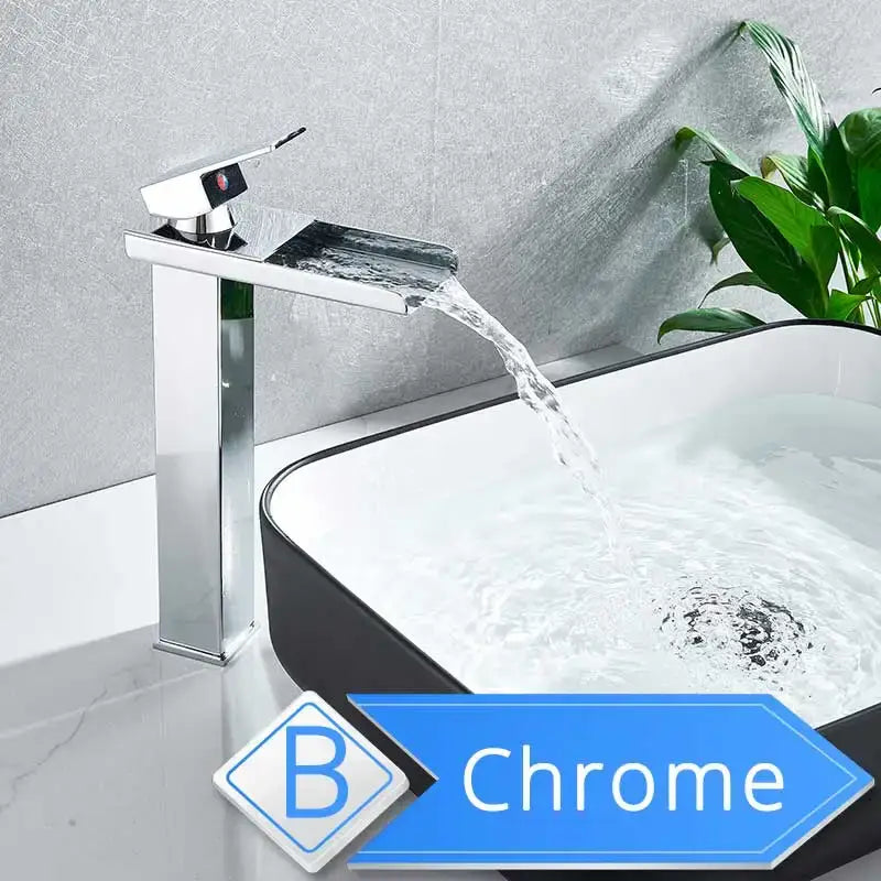 Modern brushed nickel single lever basin faucet with chrome finish and sleek waterfall design for bathroom use