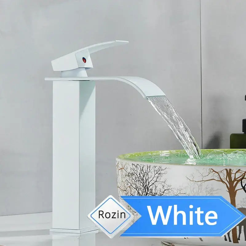 Modern brushed nickel single lever basin faucet with a white rozin waterfall design and sleek polished finish