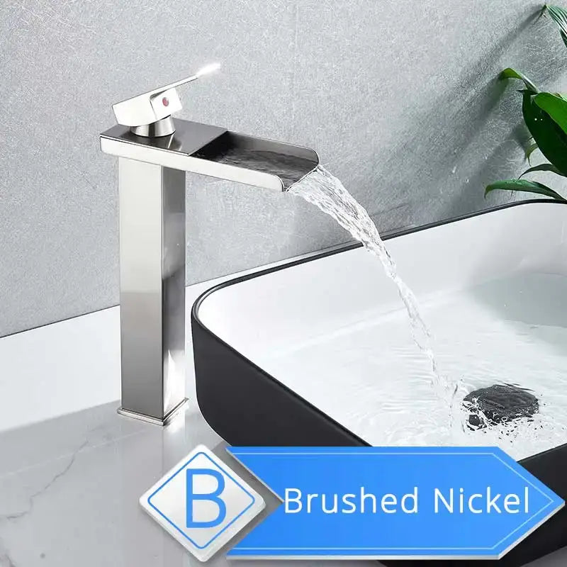 Modern brushed nickel single lever basin faucet with a sleek rectangular spout and waterfall design for bathroom use