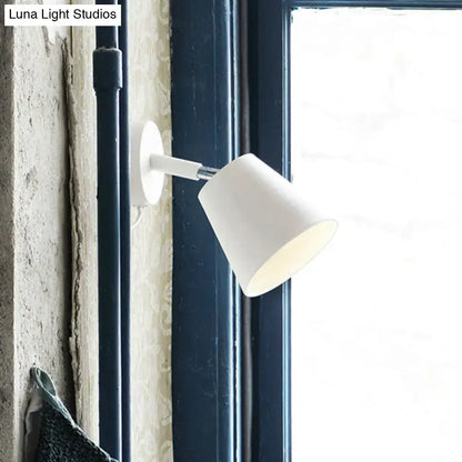 Modern brushed nickel tapered wall sconce wall light sconce in white with a sleek minimalist cylindrical design
