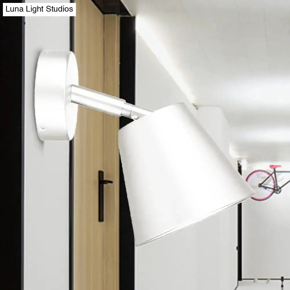 Modern brushed nickel tapered wall sconce with white adjustable matte shade and sleek metallic arm wall light sconce