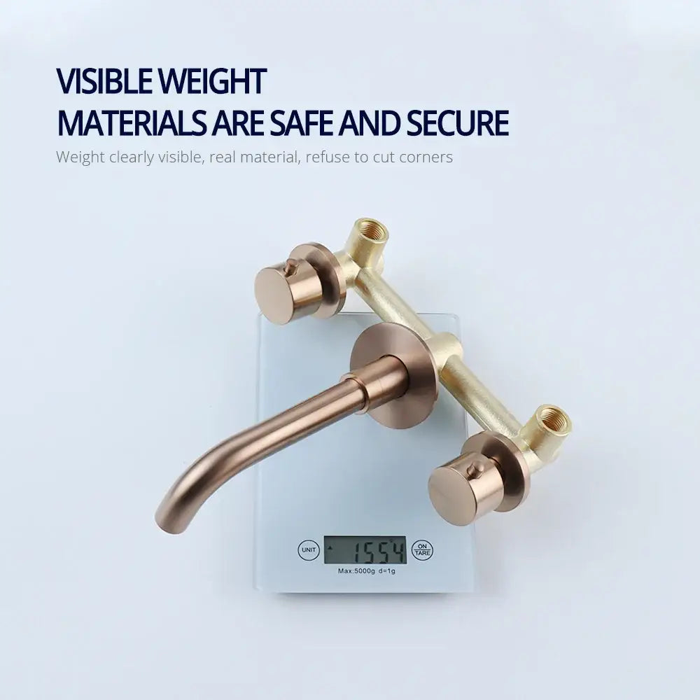 Modern brushed rose gold dual handle bathroom faucet with valve control and brass-finished curved spout assembly
