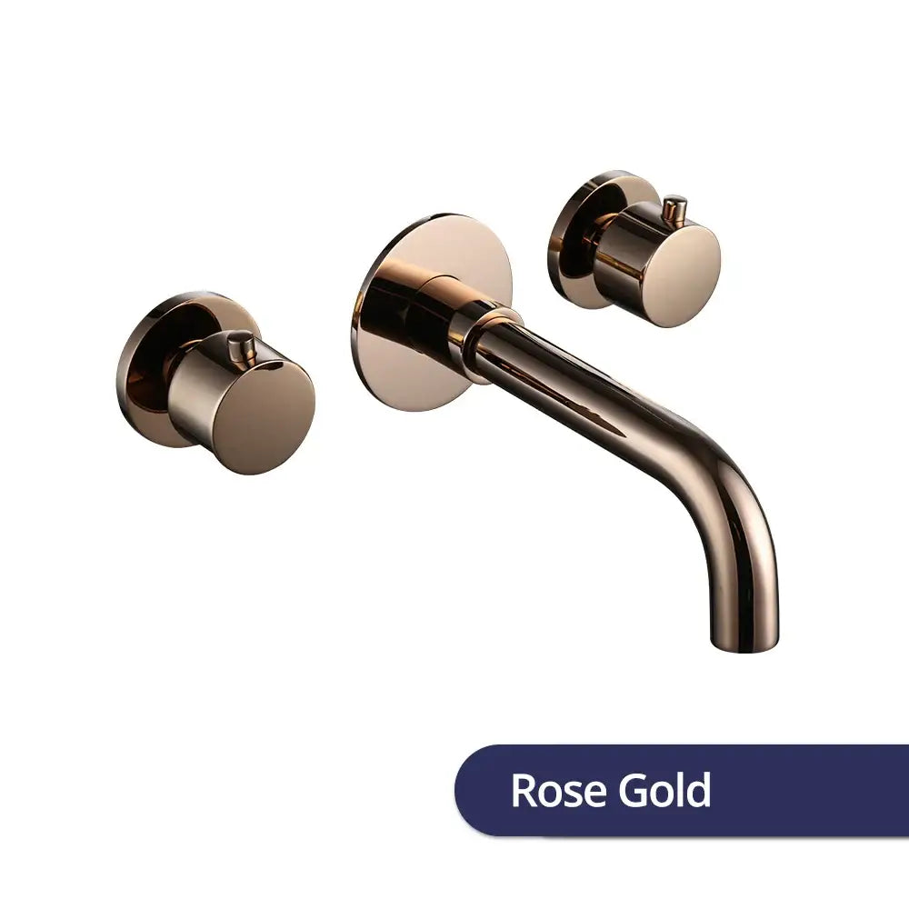 Modern brushed rose gold dual handle wall mount faucet with valve control and a sleek curved spout for bathroom use