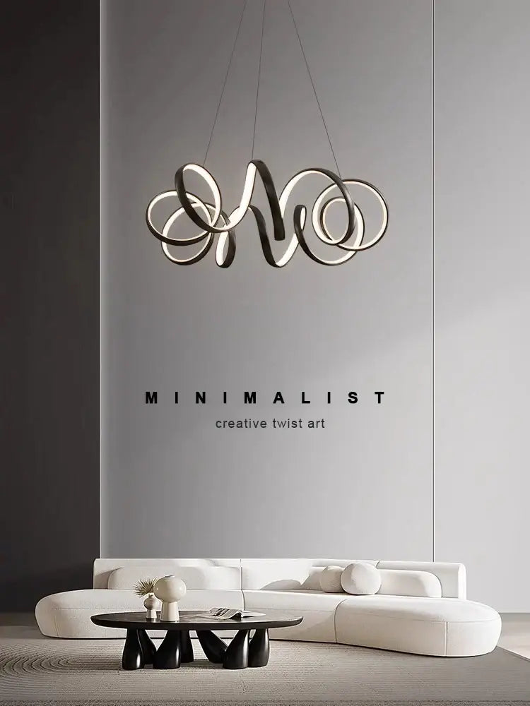 Modern brushed silver creative twisted led chandelier with interlocking circular rings in sleek metallic finish for living room decorbites creative twisted