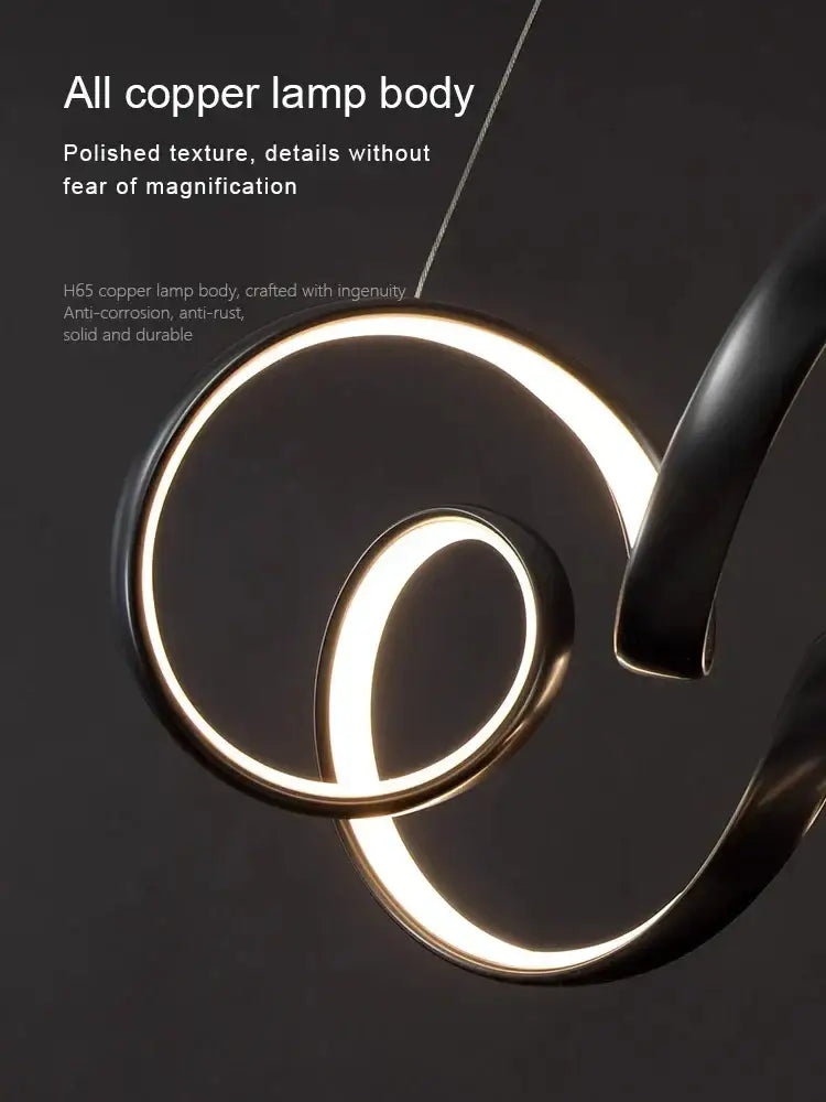 Polished copper lamp body with sleek intertwined circular design and glowing led lighting in creative twisted led chandelier decorbites