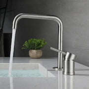 Modern brushed stainless steel kitchen faucet with curved spout and minimalist design in brushed stainless finish