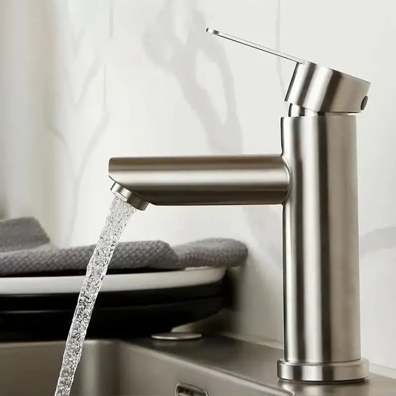 Modern brushed stainless steel single-handle faucet with sleek minimalist design for bathroom basin use