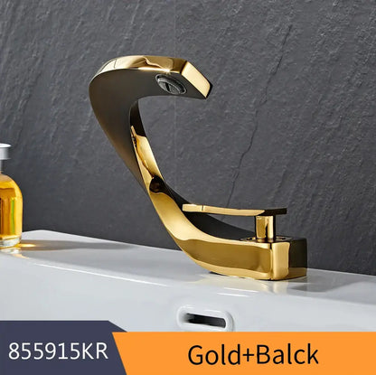 Modern brushed stainless steel decorbites basin faucet in gold and black with a sleek curved waterfall design for bathroom use