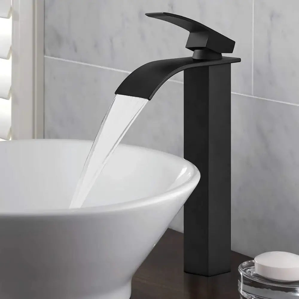 Modern brushed stainless steel basin faucet in black matte finish with sleek brass waterfall basin design for bathroom decorbites brass waterfall tap