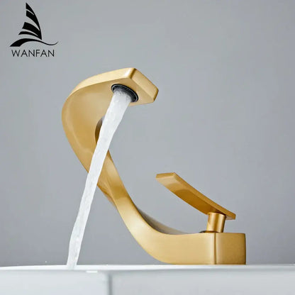 Gold modern decorbites basin faucet with sleek curved design and brushed stainless steel finish for bathroom use