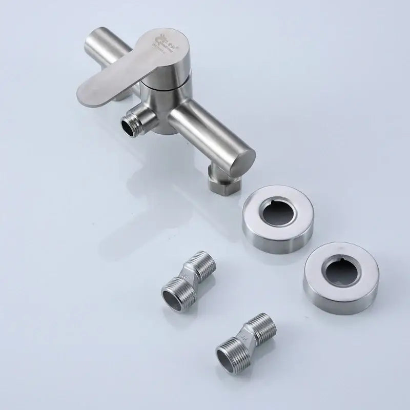 Modern brushed stainless steel and white ceramic shower mixer with sleek stainless steel bathroom faucet and matching hardware