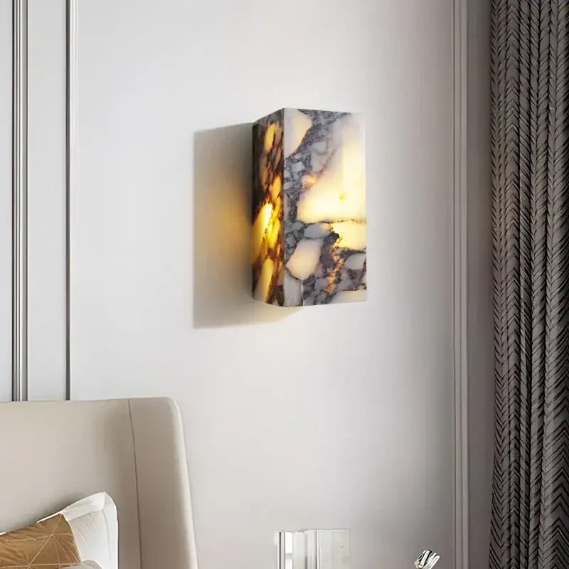 Modern bulgari stone led wall lights featuring a rectangular illuminated polished onyx sconce with white and golden-yellow decorbites bulgari stone patterns