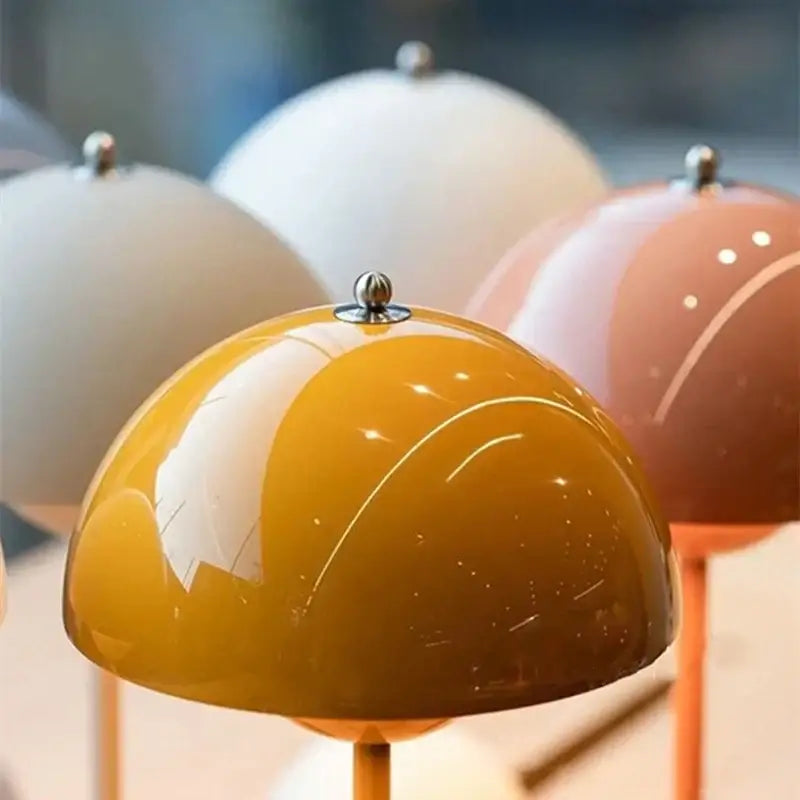 Vibrant mustard-yellow dome-shaped decorbites iron mushroom shape table lamp with glossy finish and silver finial