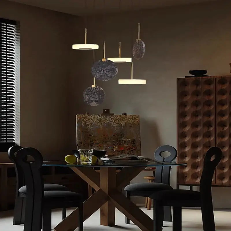 Modern burlywood marble led ceiling chandelier with circular and spherical glass pendant lights in gold-toned decorbites burlywood marble design