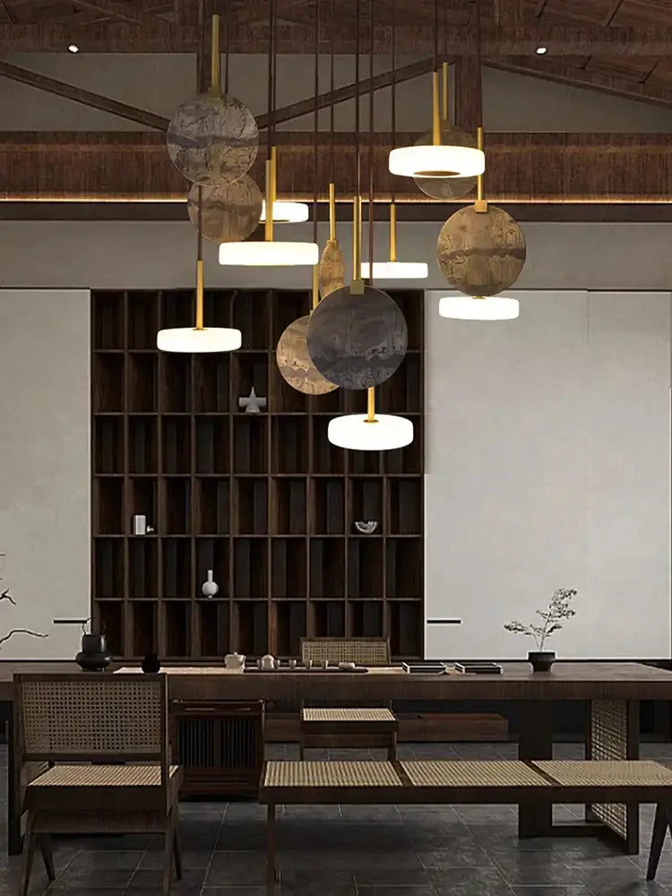 Modern burlywood marble led ceiling chandelier with circular translucent shades in warm beige and muted gold tones by decorbites burlywood marble