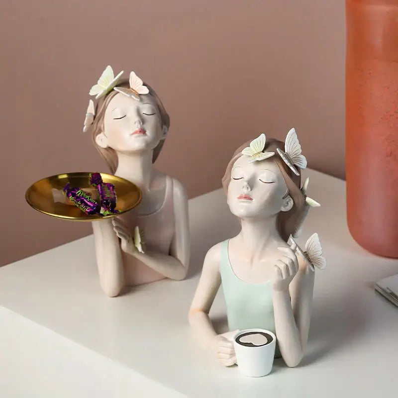 Modern butterfly girl resin sculpture featuring two ceramic women with butterfly hair accessories for living room decorbites butterfly girl decor