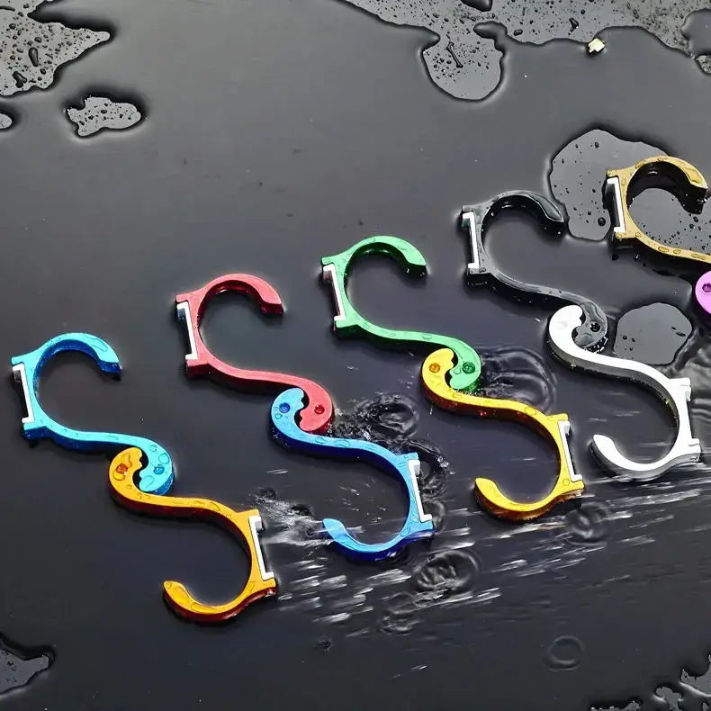Modern candy color aluminum finish wall hooks in vibrant blue red green yellow and silver from decorbites candy color line