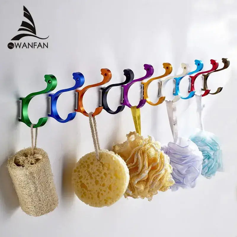 A row of modern candy color aluminum finish wall hooks in green blue orange black purple gold silver red and white for kitchen organizer