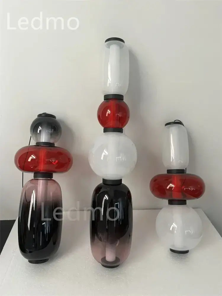 Modern candy glass ceiling chandelier with stacked red and white glass segments and black fittings for loft decorbites candy glass
