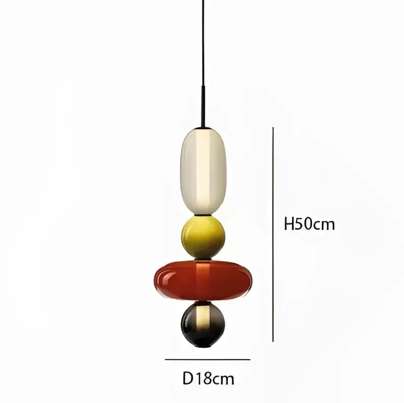 A modern pendant light with stacked colorful glass orbs in cream yellow red and black for candy glass ceiling decorbites