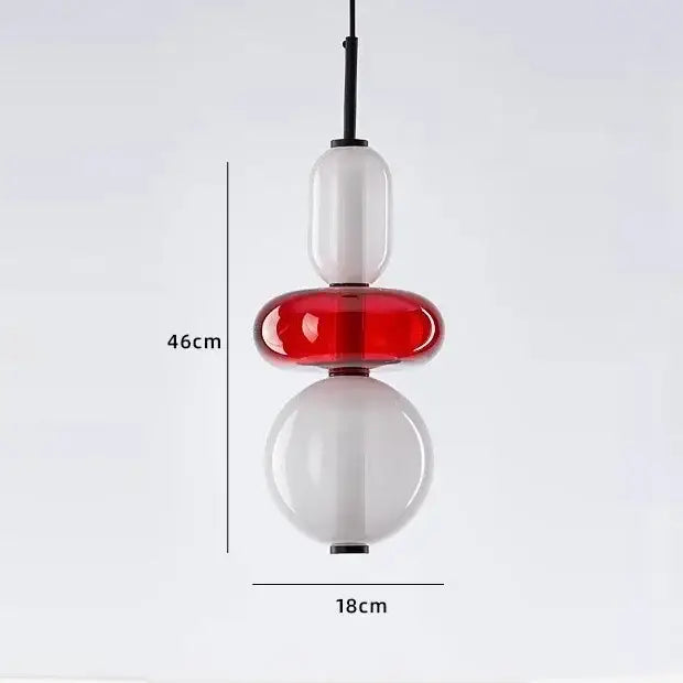 Modern candy glass ceiling hanging chandelier featuring stacked translucent white and vibrant red glass orbs by decorbites