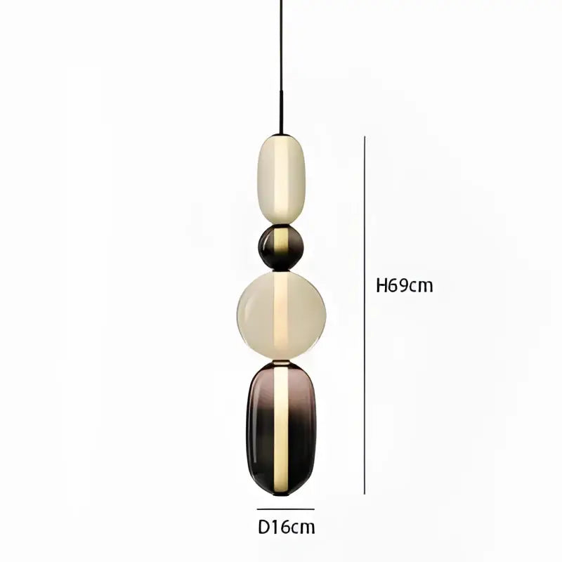 A modern candy glass ceiling chandelier with five translucent cream amber and dark brown orbs for loft decorbites decor
