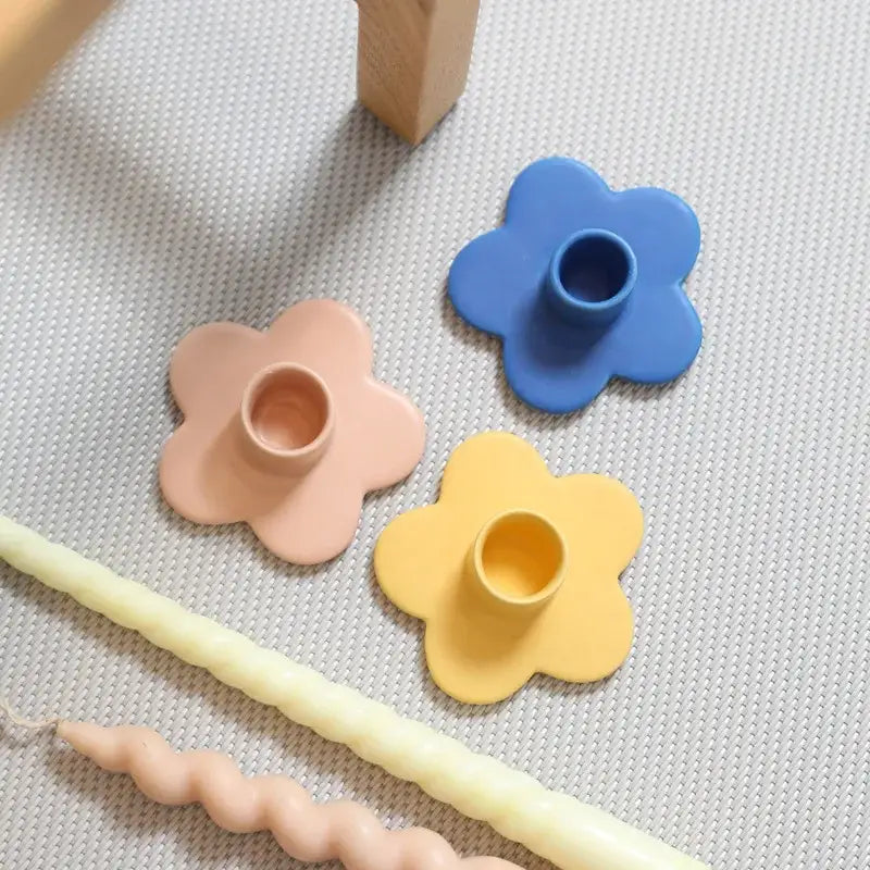 Pastel-colored cartoon flower candle holders in soft pink blue and yellow for bedroom desktop decorbites cartoon flower