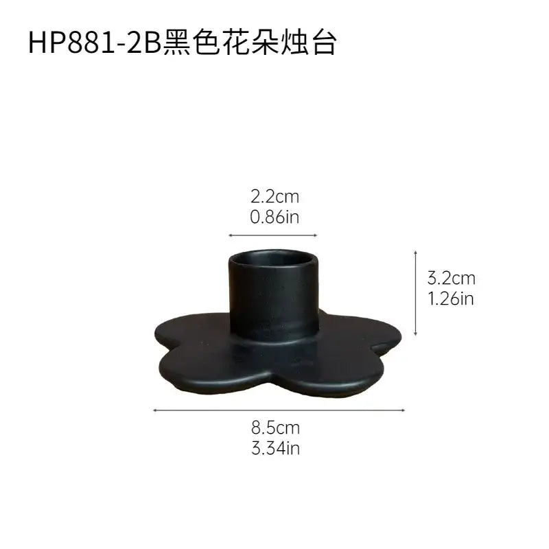 Black matte cartoon flower candle holder with central opening for bedroom decorbites cartoon flower desktop storage