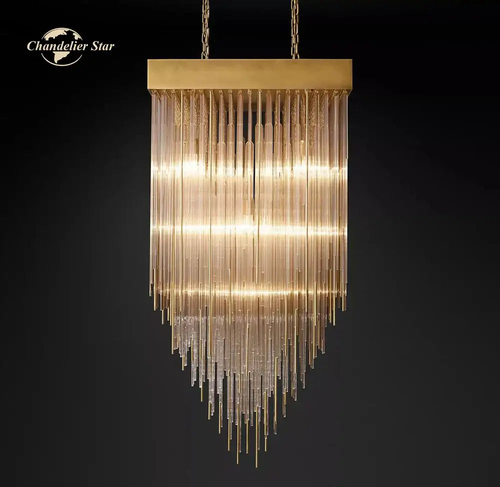 Modern cascada led glass chandelier with gold-toned brass frame and cascading clear glass rods for dining room decorbites cascada led