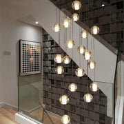 A modern cascading pendant light with multiple spherical glass globes decorbites crystal ball led for living room decor
