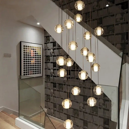 A modern cascading pendant light with multiple spherical glass globes decorbites crystal ball led for living room decor